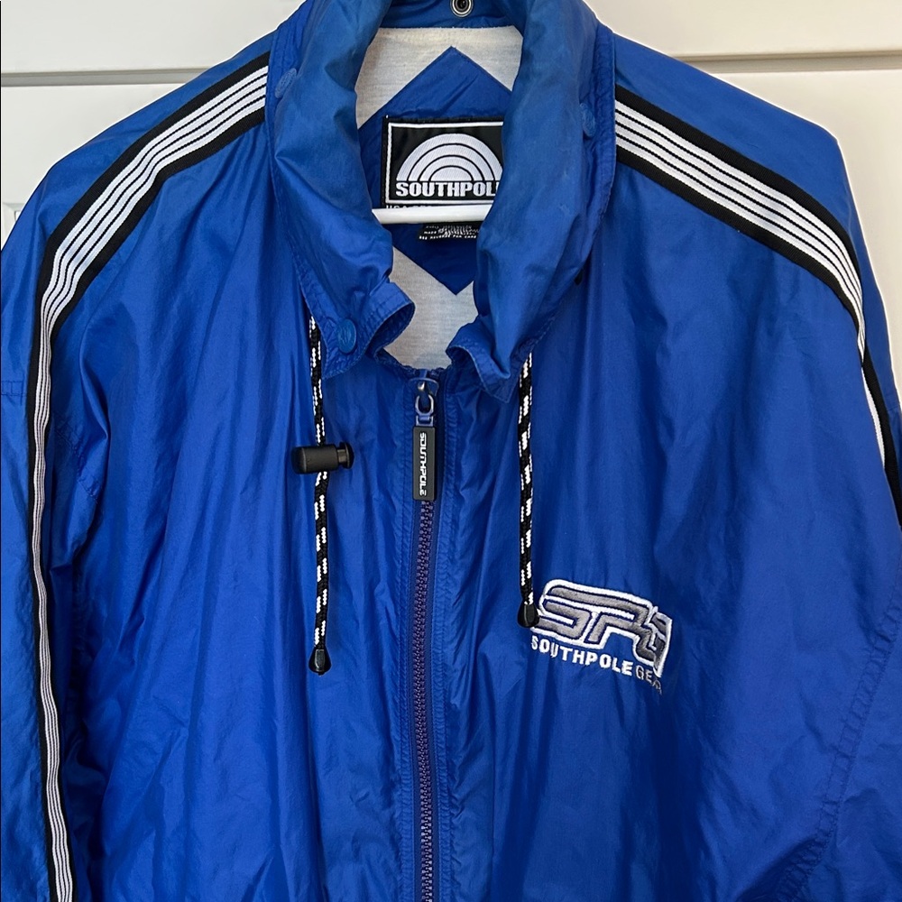 Royal blue South Pole Gear jacket. Light lining, hidden hood, Velcro pockets